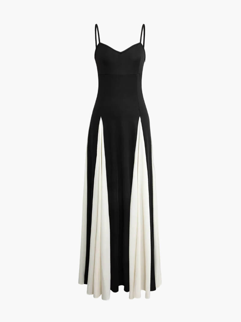 Modern flowy black and white contrast maxi dress for women, ideal for special occasions.