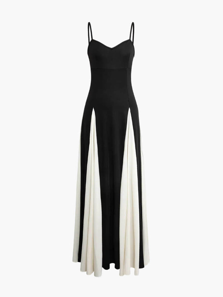 Modern flowy black and white contrast maxi dress for women, ideal for special occasions.