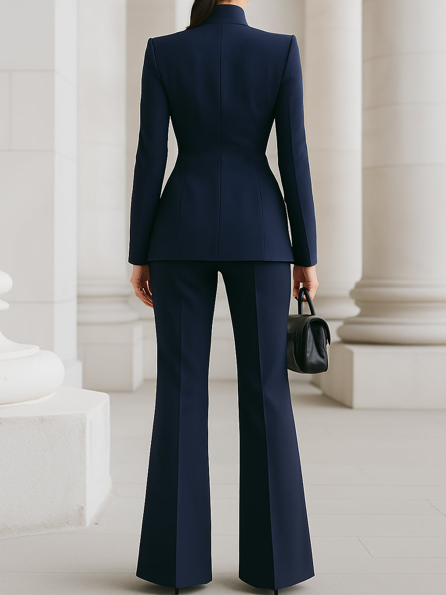 Classic women's elegant two-piece suit with a tailored blazer and matching trousers.