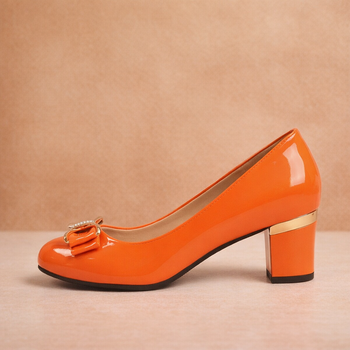 Close-up of the elegant bow detail on women's block heel pumps, highlighting sophisticated and comfortable design.