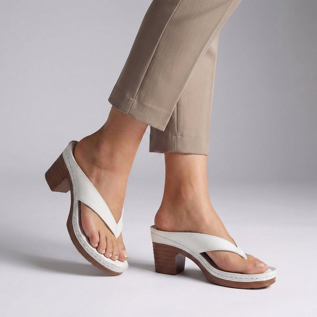 Close-up of women's thong sandals with a trendy platform and block heel