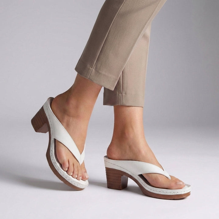 Close-up of women's thong sandals with a trendy platform and block heel