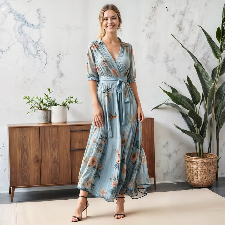 Chic blue floral midi dress for women featuring a V-neck, tie-waist & puff sleeves, perfect for casual or elegant wear.