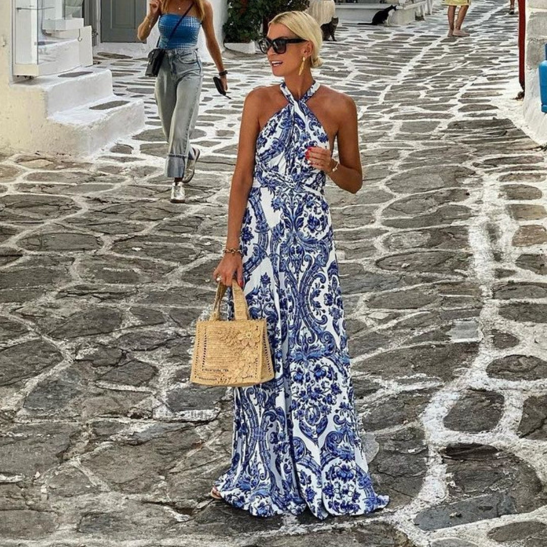 Chic women's blue halter A-line maxi sundress for effortless summer fashion. Ideal casual and elegant vacation beachwear.