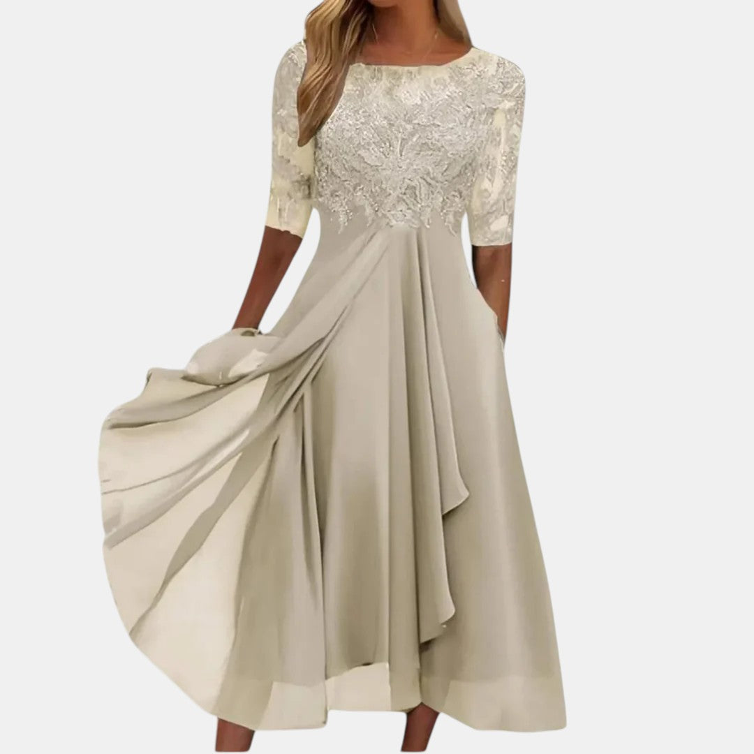 Flowing women's pink party dress with a flattering fit, featuring elegant lace-inspired details for special events.