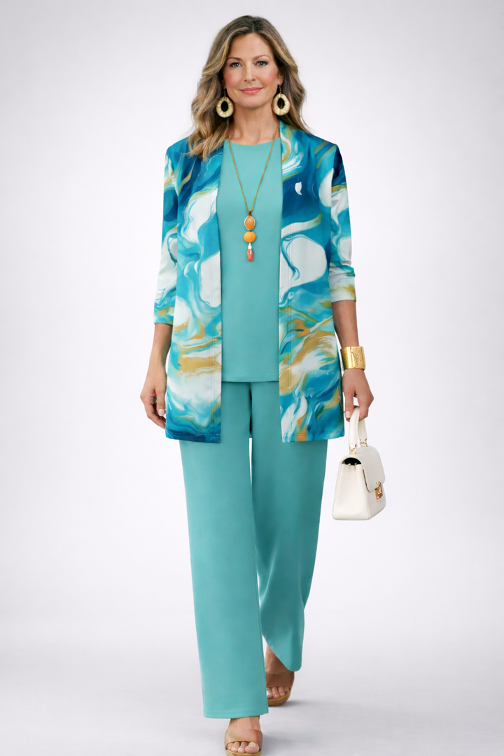 Comfortable women's marble print 3-piece set in blue, ideal for travel or spring/summer wear. Relaxed, elegant style.