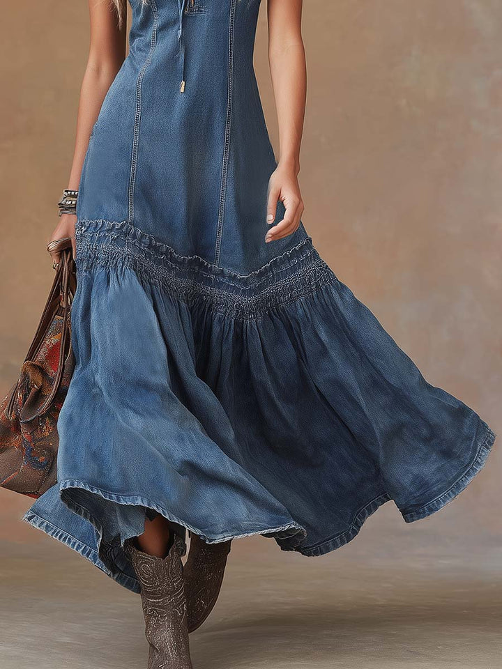 Elegant blue sleeveless maxi dress for women, with a collared laced neckline and flowing gathered skirt, great for holidays.
