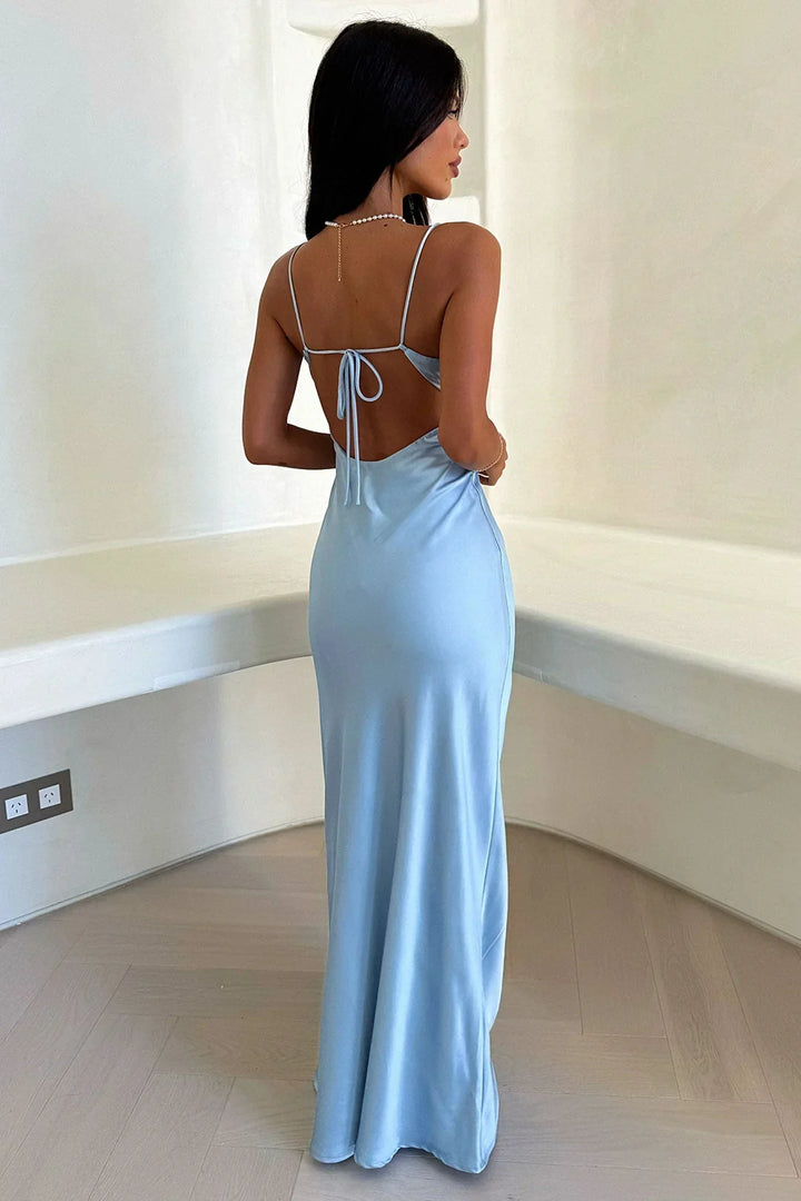 Formal women's V-neck blue maxi dress. Elegant evening gown perfect for wedding guests & sophisticated occasions.