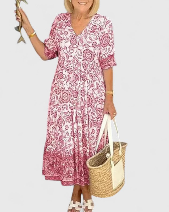 Versatile women's pink midi dress. Flattering v-neck, half sleeve elegant design for cocktails & occasions.