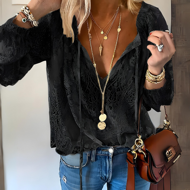 Women's elegant boho blouse with cutout neckline, perfect for casual chic summer fashion or versatile everyday wear.