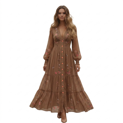 Comfortable women's elegant bohemian maxi dress with floral embroidery, long sleeves, and a flattering tiered silhouette.