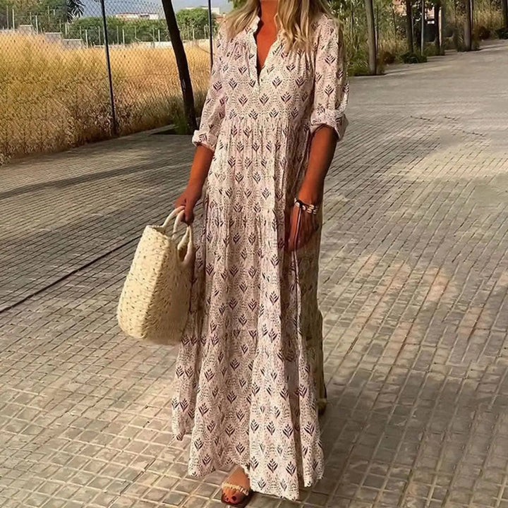 Boho chic women's floral print maxi dress, V-neck design, flowy and elegant for summer parties & special events.