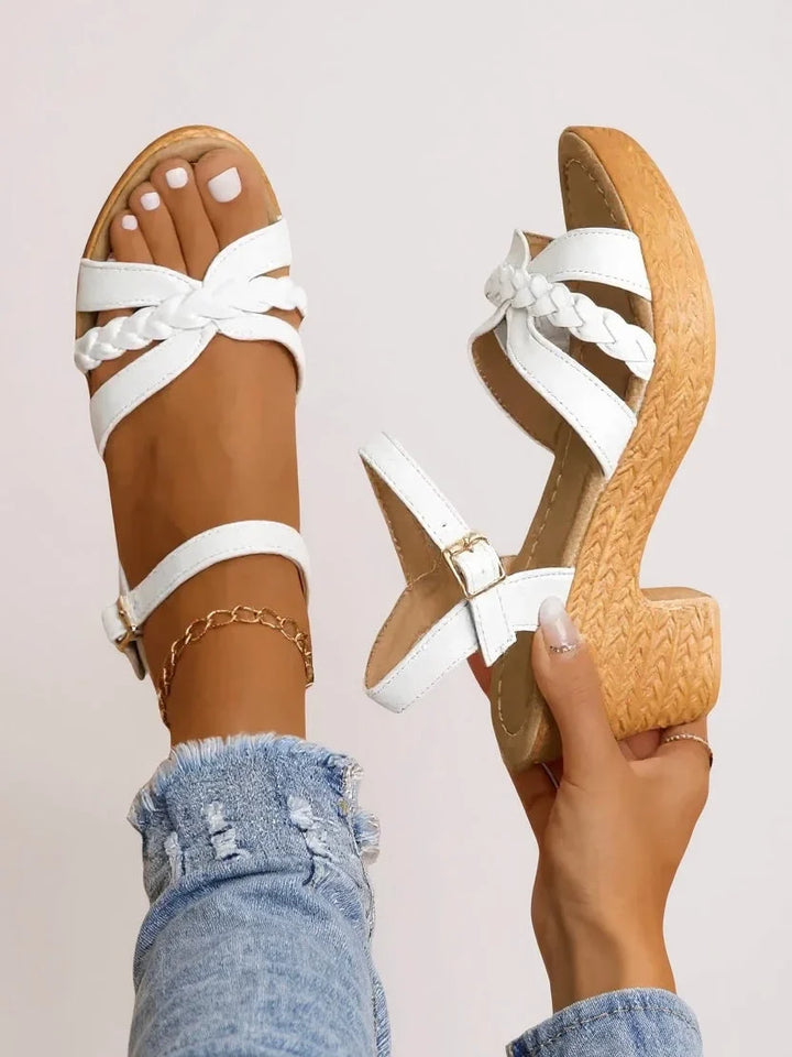 Women's cushioned platform sandals with trendy braided straps & a sturdy block heel for all-day wear.