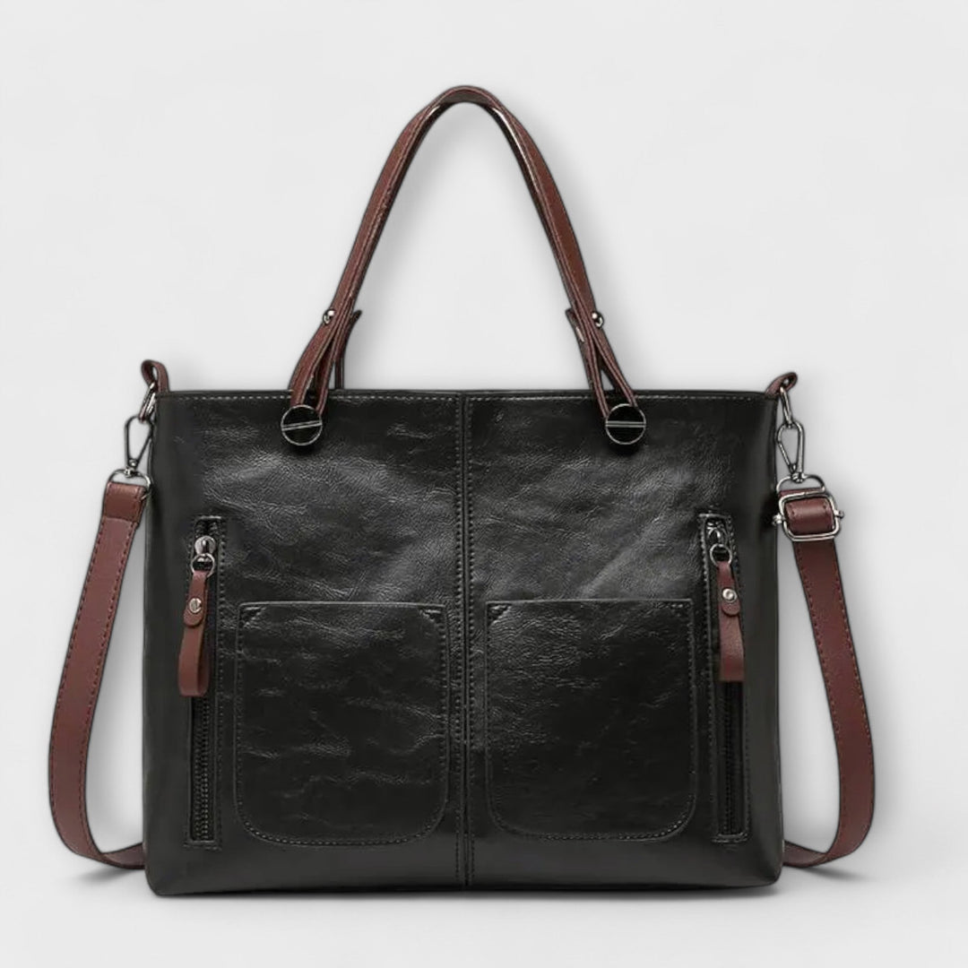 Black leather shoulder bag for women. Stylish, elegant, & versatile for work, travel, or daily use.