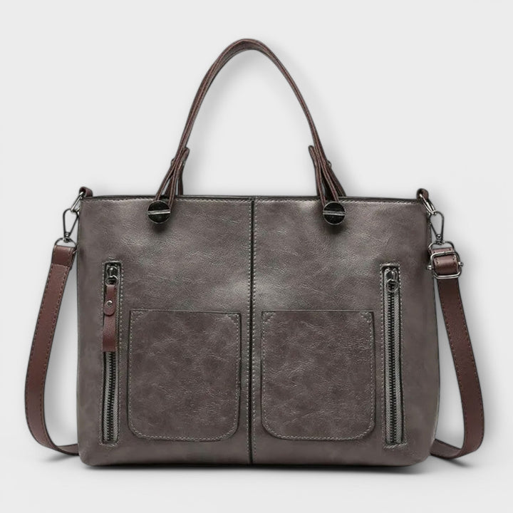 Versatile women's leather shoulder bag. Elegant design, ideal for everyday, work, or travel.