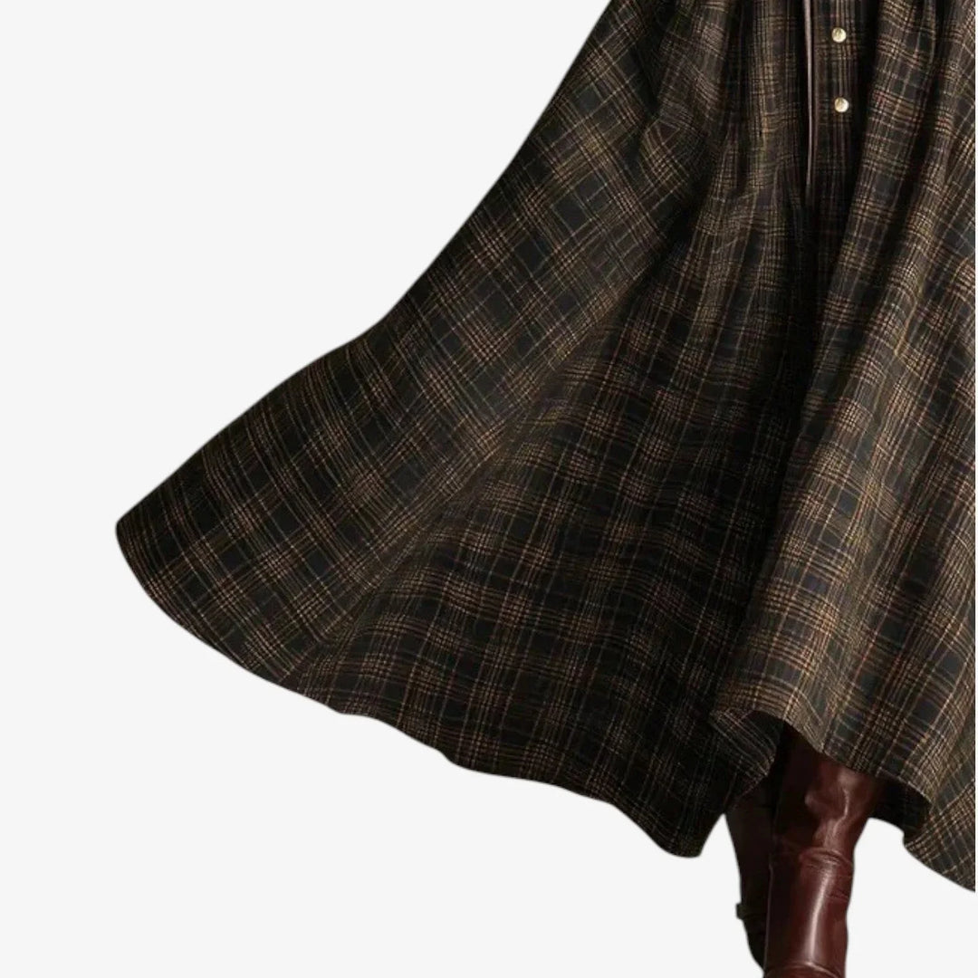Stylish autumn women's plaid maxi dress featuring a collared, button-front design, long sleeves, and side pockets.