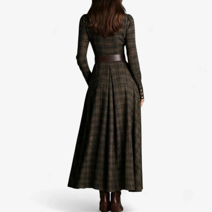 Vintage-inspired women's plaid maxi dress. Collared, long sleeve, button-front with pockets. Elegant and comfortable.