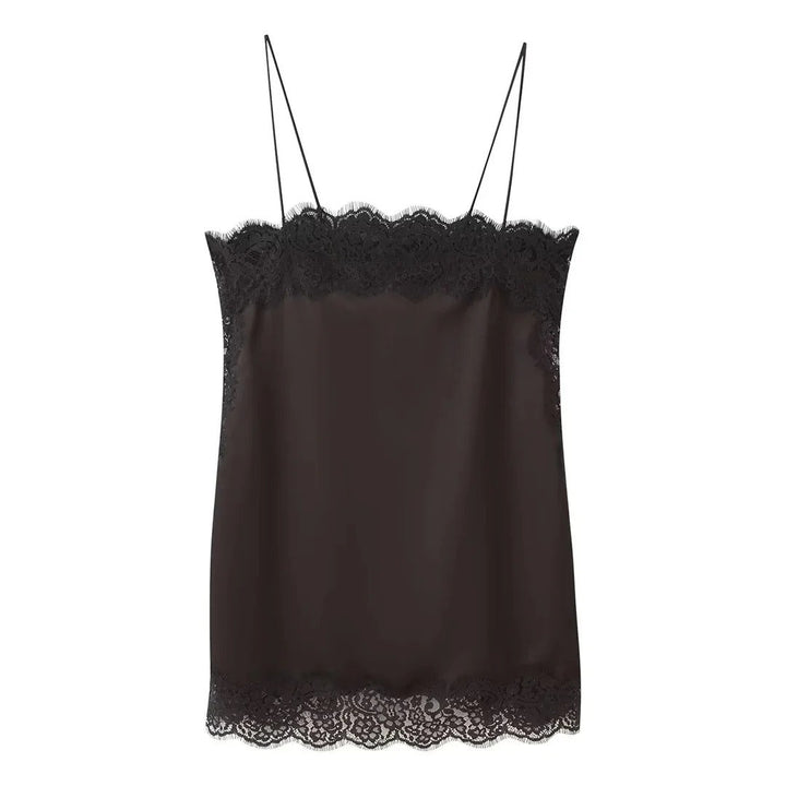 Brown coordinated women's elegant two-piece top and midi skirt set. Chic formal outfit for special occasions.