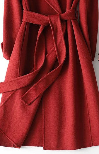 Sophisticated women's burgundy belted wrap coat with elegant A-line silhouette, a chic long coat for any occasion.