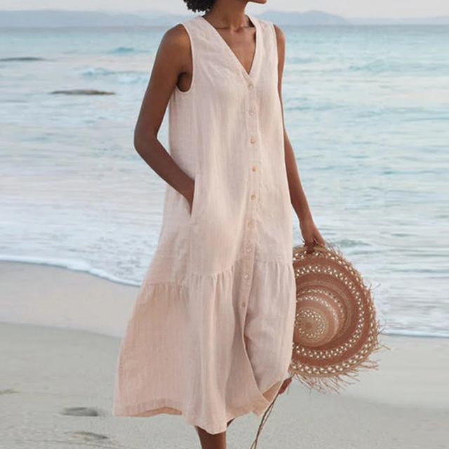 Elegant women's button-down midi summer dress in flowing fabric, perfect for effortless casual and day style.