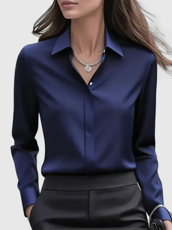 Premium women's button-down top, long sleeve for versatile styling, from office to casual elegance.