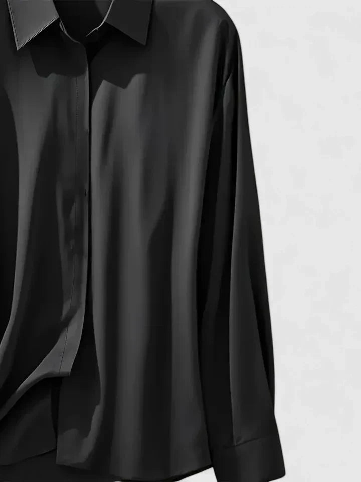Stylish women's apparel: elegant button-down long sleeve top, perfect for office or formal events.