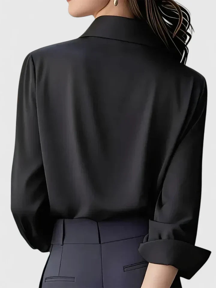 Versatile women's elegant top, button-down design for office, casual, or formal occasions. Long sleeve.