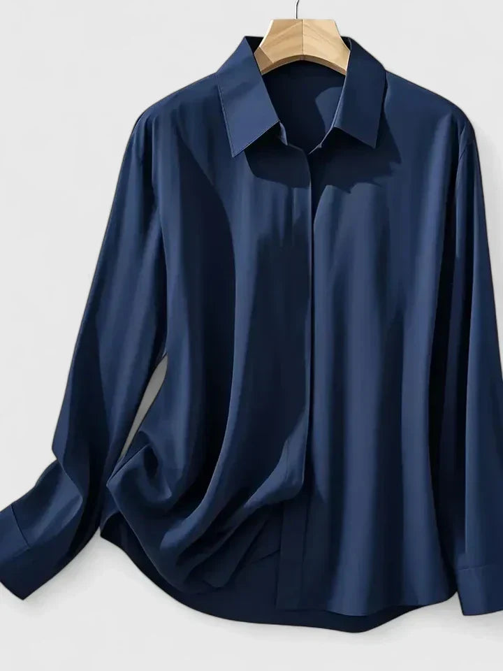 Chic women's button-down long sleeve top, perfect for sophisticated office wear or casual outings.