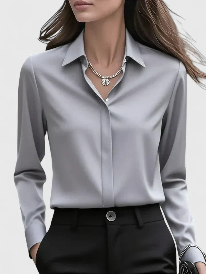 Women's classic button-down shirt, a versatile long sleeve top for formal or casual chic apparel.