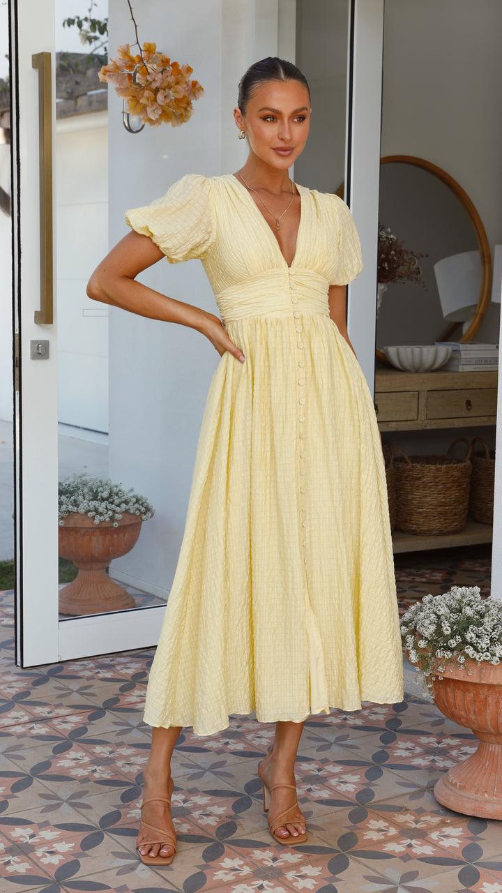 Casual yet elegant button-front maxi dress for women, featuring a flowy design perfect for spring and summer.