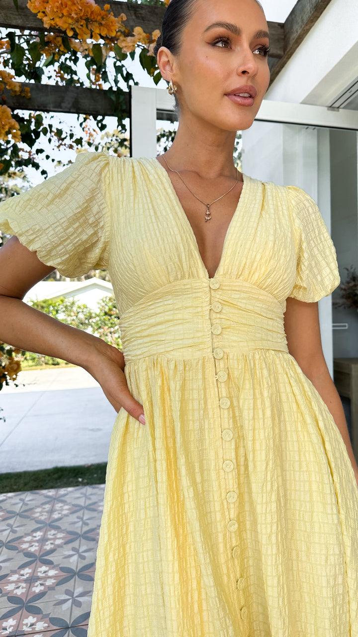 Women's elegant flowy maxi dress with button-front, a versatile long dress for spring, summer, and autumn fashion.