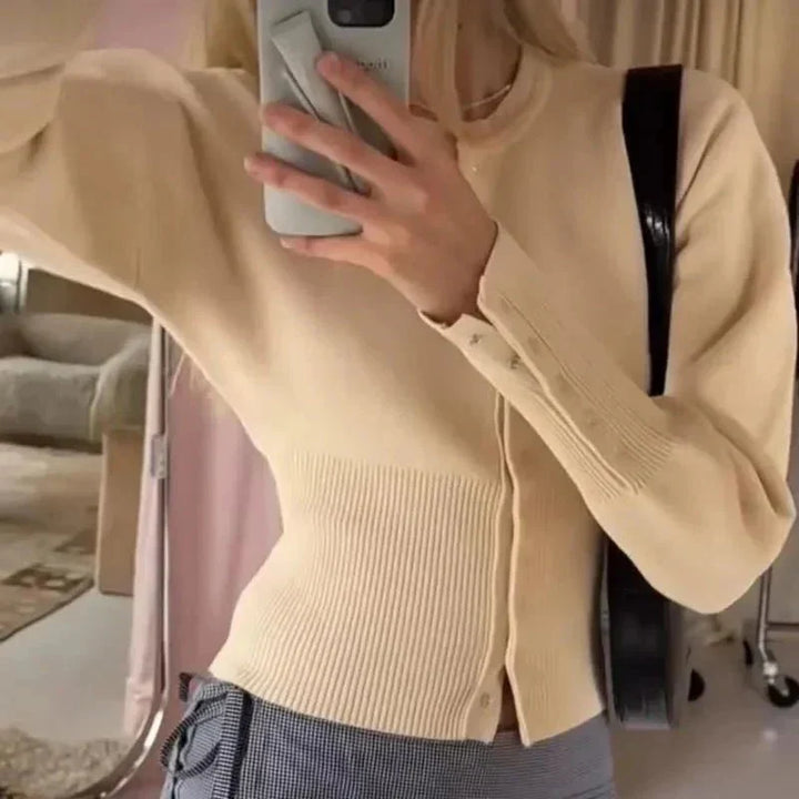 Chic women's round neck button-up cardigan, an elegant layering piece for spring outfits & versatile style.