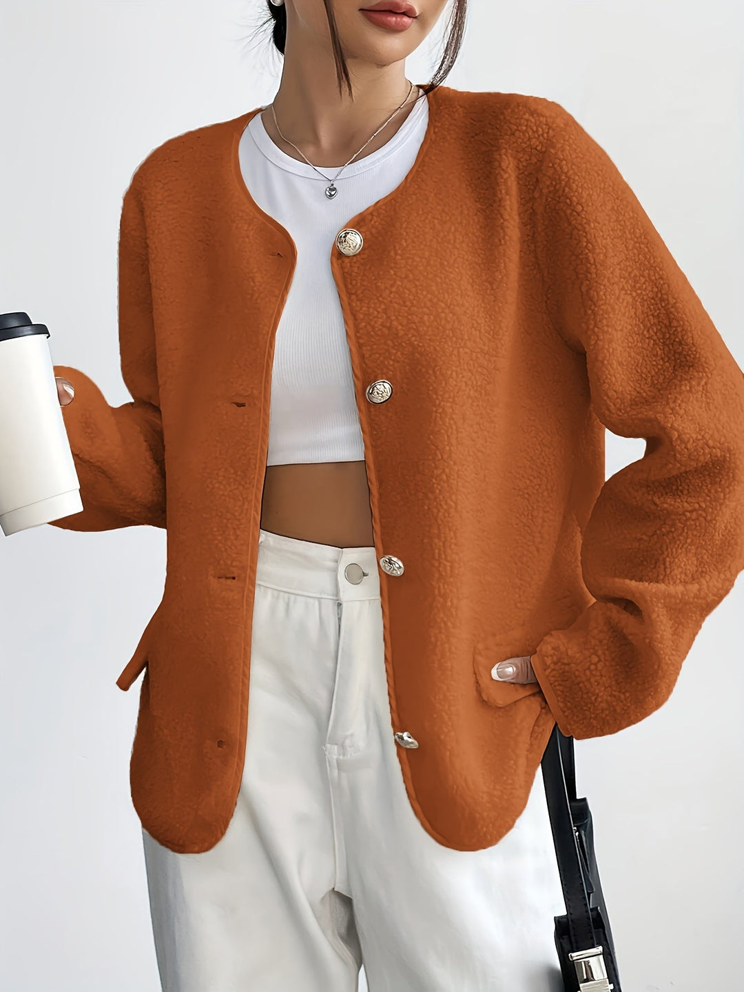 Elegant women's button-up jacket. Timeless fall & winter fashion.