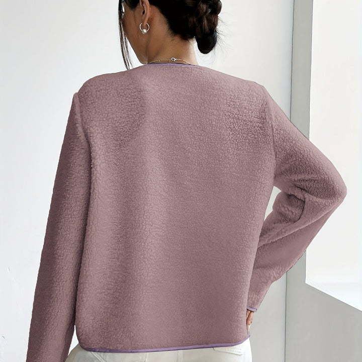 Soft & elegant women's button-up jacket, ideal for cozy fall/winter fashion.