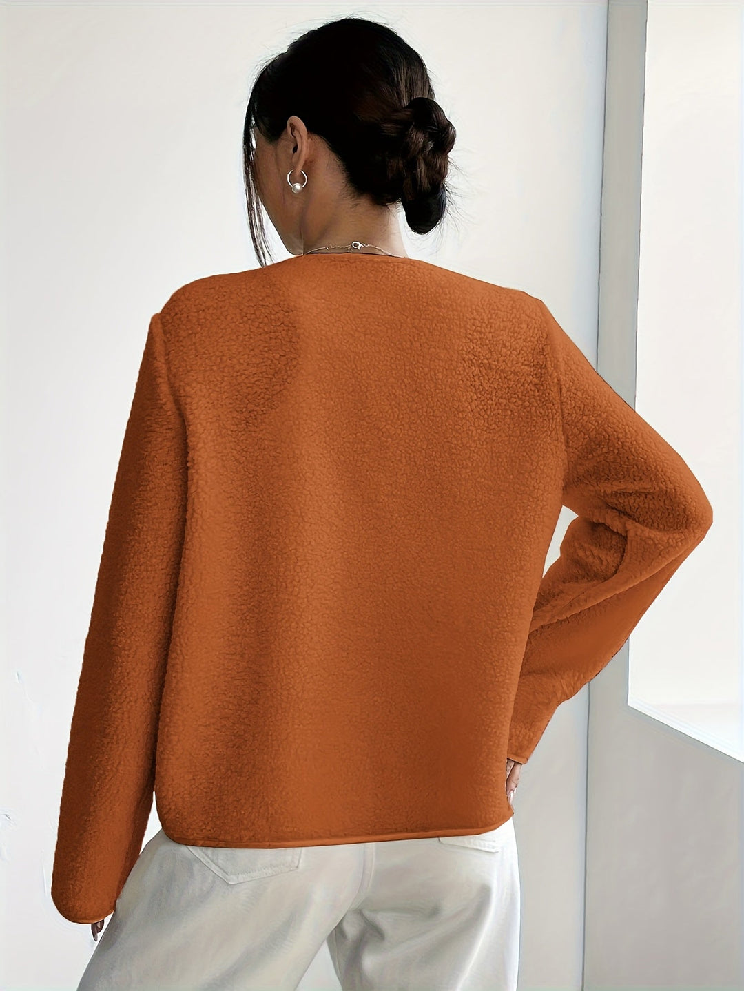 Classic women's elegant button-up jacket, a timeless choice for fall & winter.