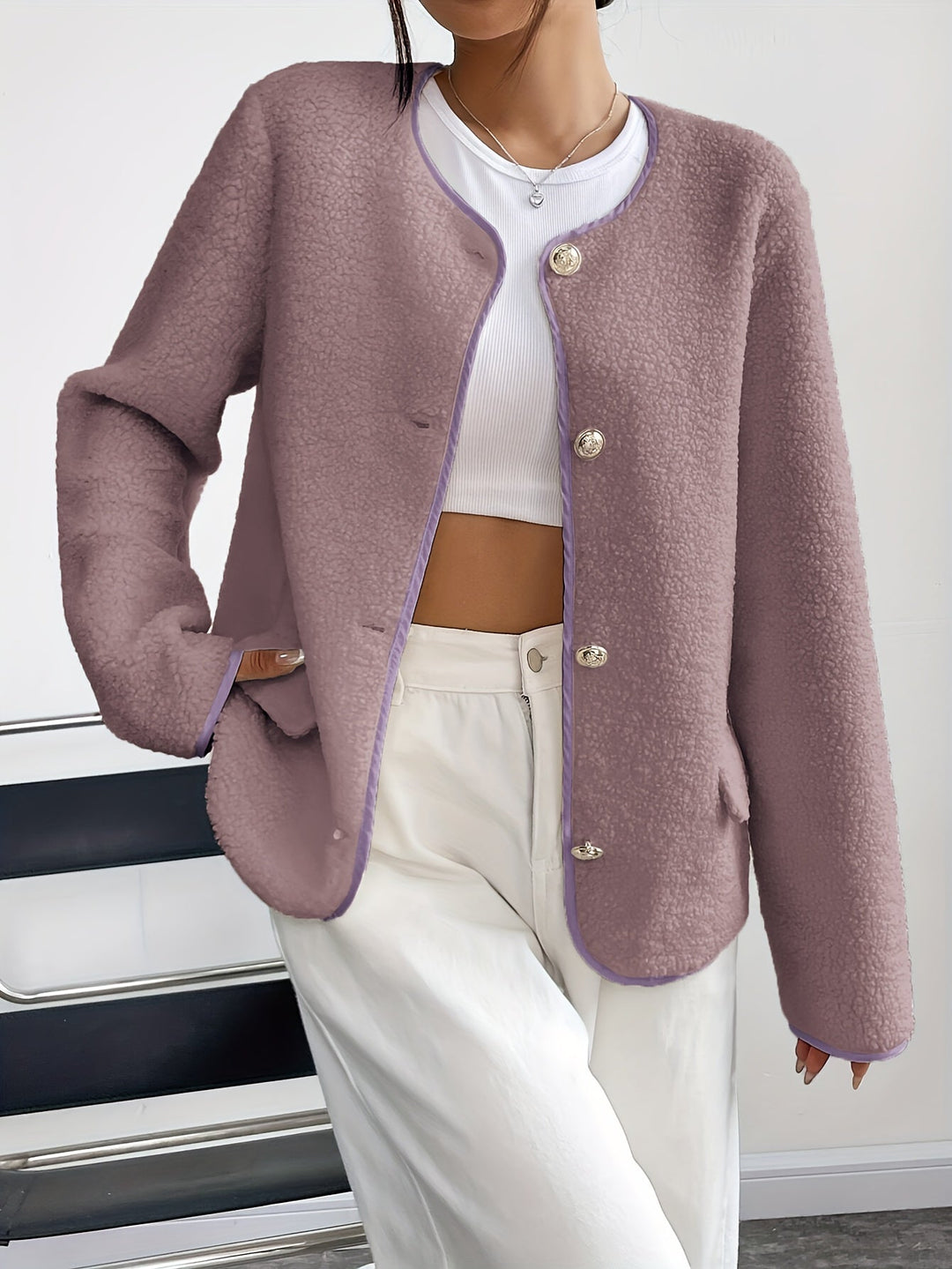 Timeless button-up jacket for women, designed for elegant fall and winter outerwear.