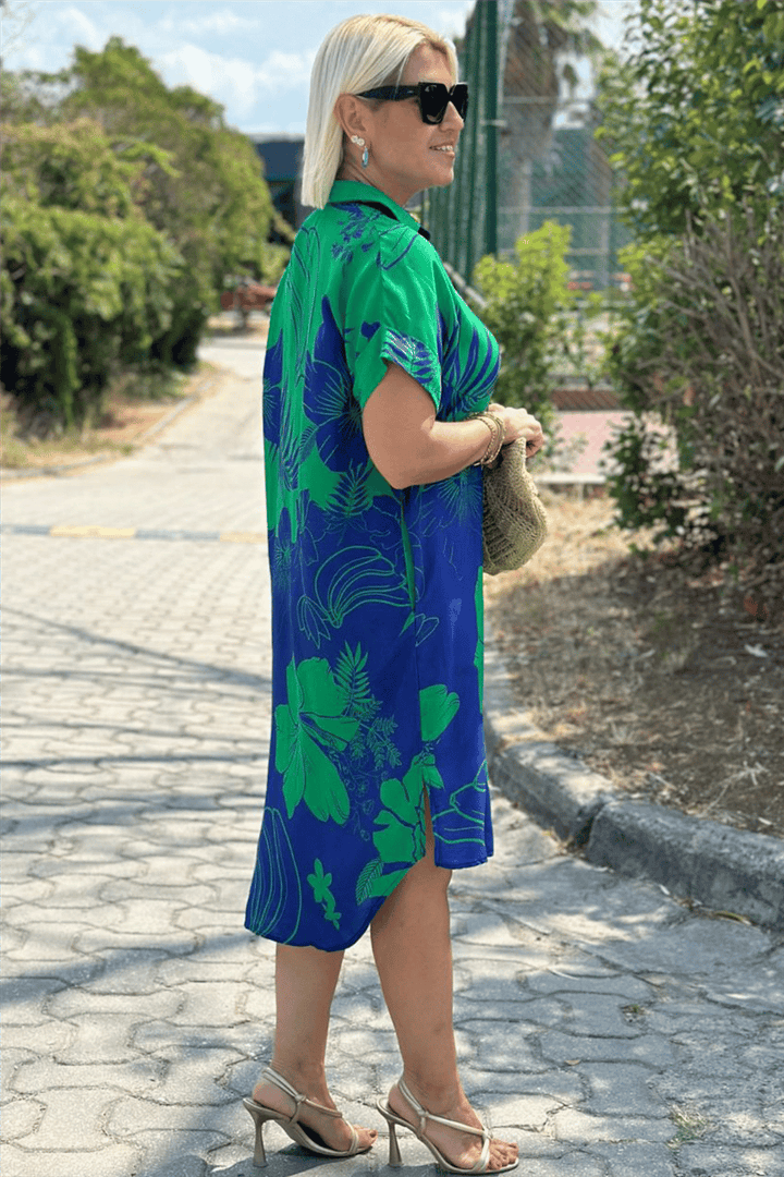 Stylish women's elegant button-up midi dress. Perfect for casual or day wear. Chic, relaxed fit.