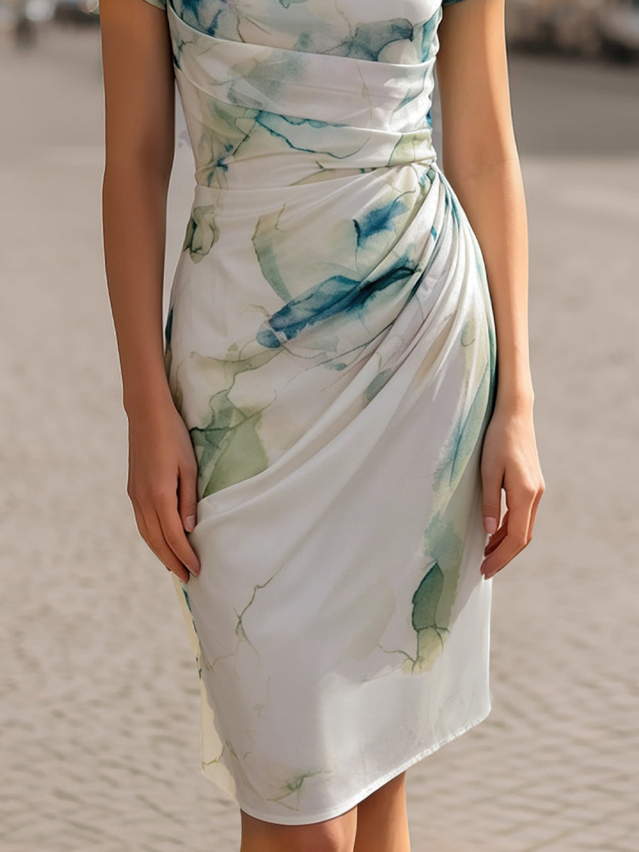 Sophisticated women's cap sleeve ruched dress featuring an abstract print, versatile for summer or autumn parties.