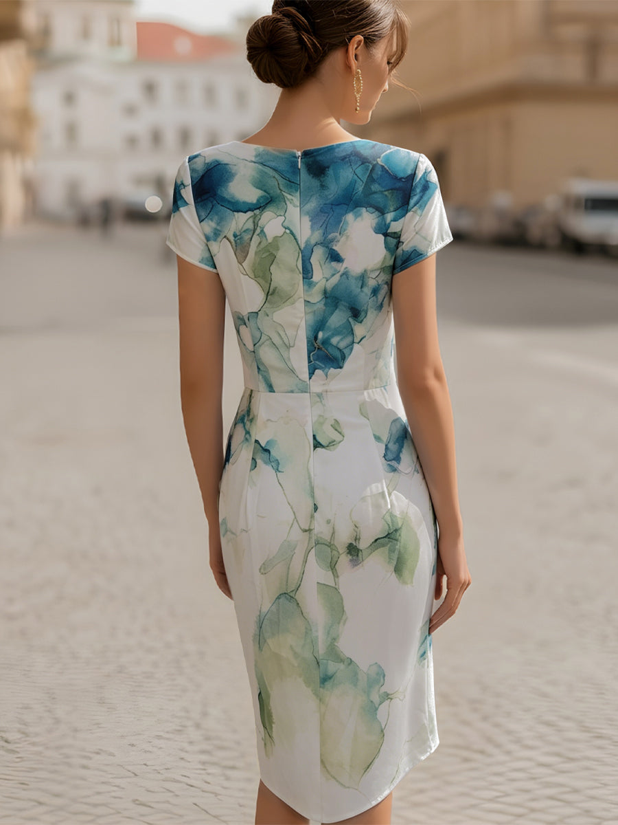 Stylish women's abstract print cap sleeve sheath dress with elegant ruching, a perfect midi for any occasion.