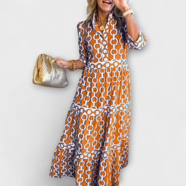 Versatile elegant chain print midi dress for women, button-front, ideal for parties or office.