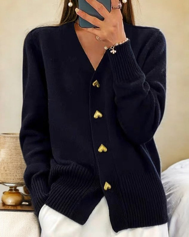 Elegant women's heart button cardigan, a cozy v-neck layer perfect for chic winter fashion and versatile wear.