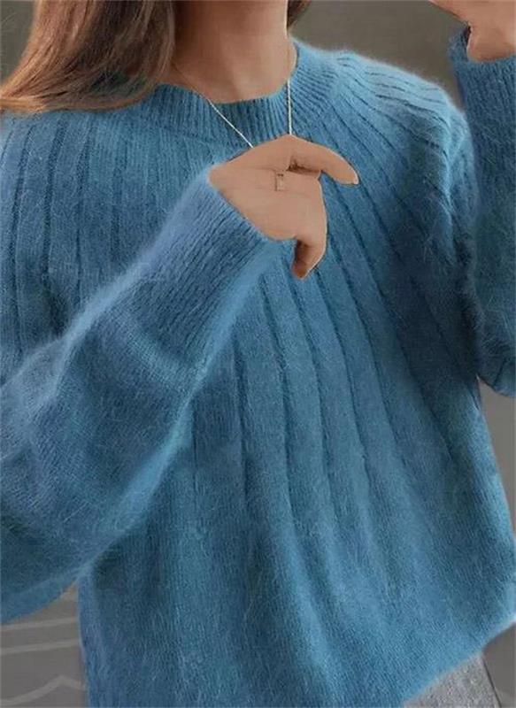 Elegant women's chic knit sweater in a cozy, versatile style for fall and winter fashion.