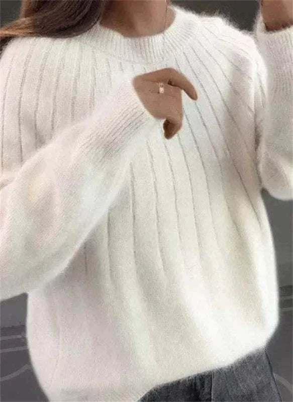 Stylish and versatile women's knit top designed for comfort and chic everyday fashion.