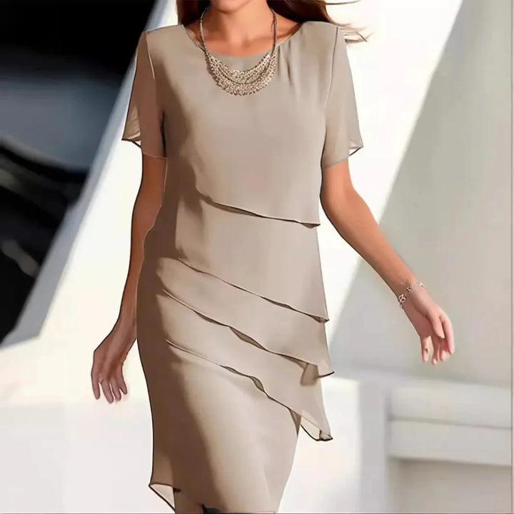 Elegant women's chiffon midi dress, perfect for casual or party wear.
