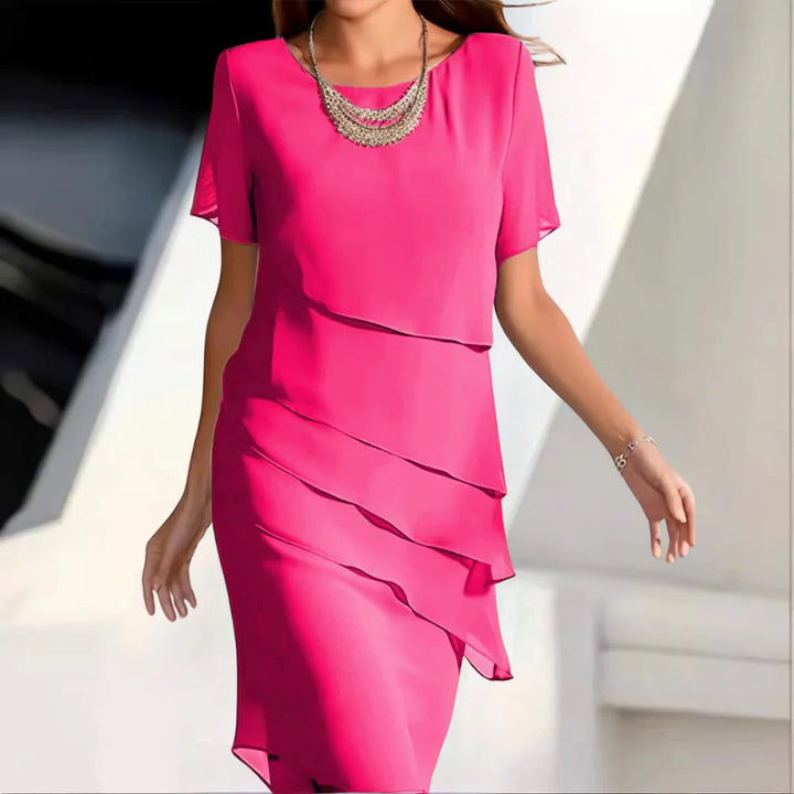 Comfortable and breathable women's summer midi dress made of chiffon.