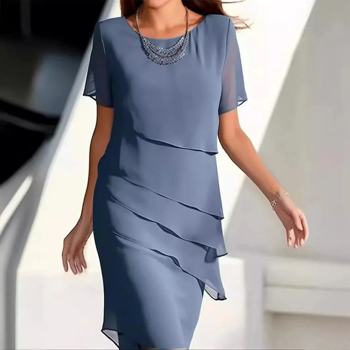 Flattering chiffon midi dress for women, ideal for elegant occasions.