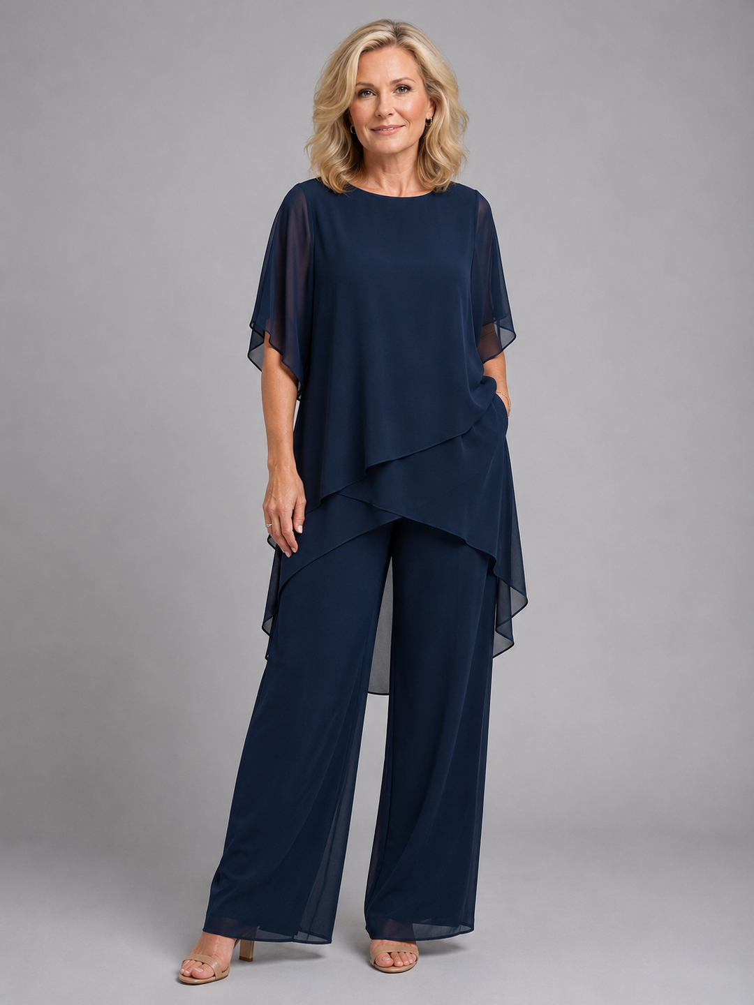 Elegant women's chiffon two-piece wide leg pant set. Perfect for special occasions with a relaxed, stylish fit.