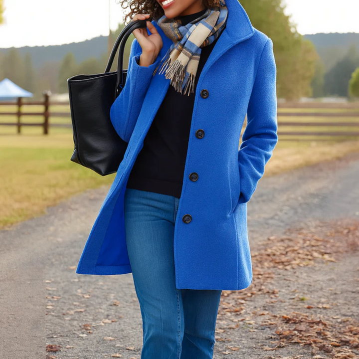Long women's classic button-up coat, elegant tailored fit, perfect for fall and winter fashion.