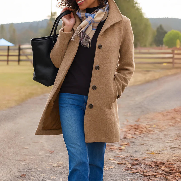 Stylish women's long button-up coat, perfect elegant outerwear for classic looks.