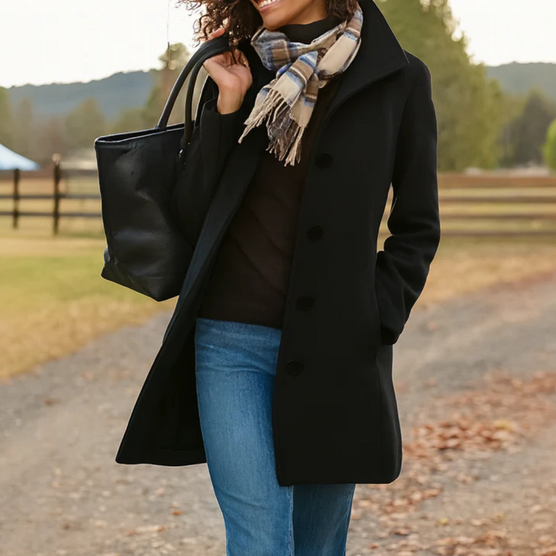 Tailored women's classic button-up jacket, sophisticated elegant outerwear style.